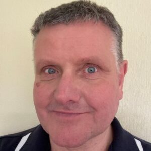 A headshot of Jonathan Bemrose, Board Member at Framework. He is smiling at the camera.