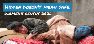 A woman rough sleeping under blankets. There is text over the top with a teal background and white text which reads Hidden doesn't mean safe. Census 2026.